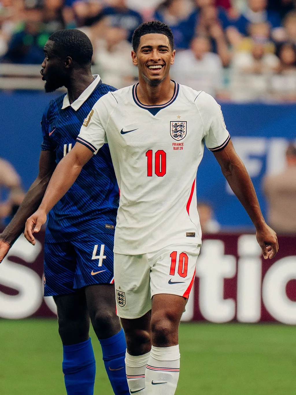 Jude Bellingham of England smiling on the pitch
